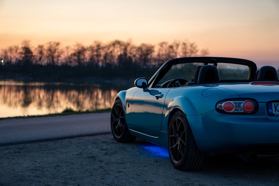 Blue sports car representing insurance and lifestyle assets